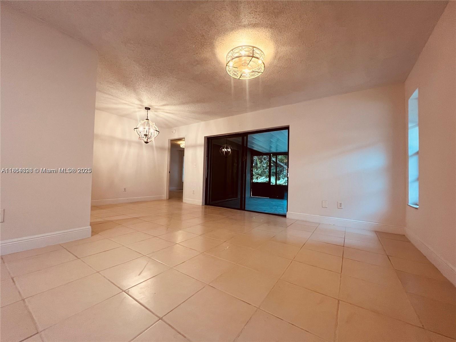 5181 Kim Court West Palm Beach, FL 33415 - Photo 7 of 24 en view interior of a house an entryway and fire place