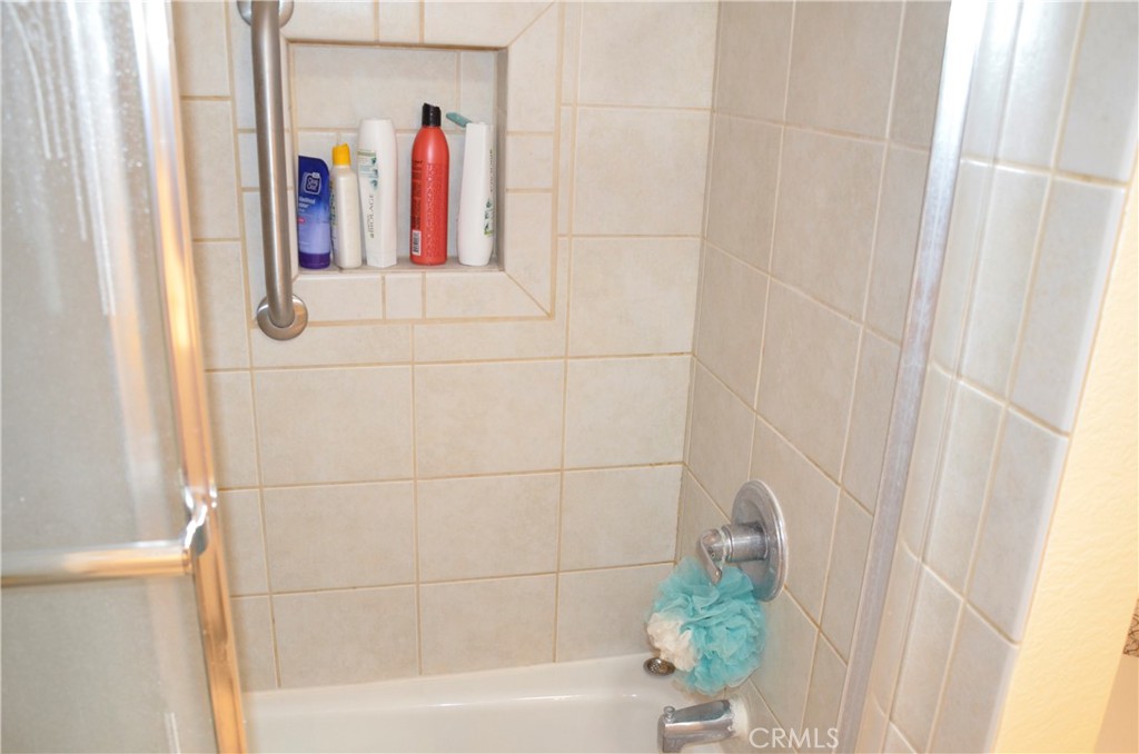 6574 Carioca Lane Riverside, CA 92506 - Photo 12 of 45 a bathroom with a shower