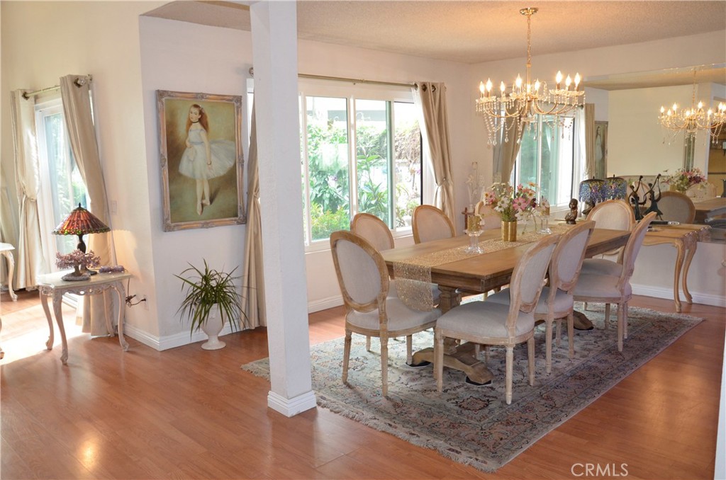 6574 Carioca Lane Riverside, CA 92506 - Photo 20 of 45 a view of a dining room with furniture window and wooden floor