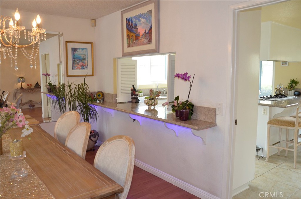 6574 Carioca Lane Riverside, CA 92506 - Photo 25 of 45 a room with furniture and a chandelier