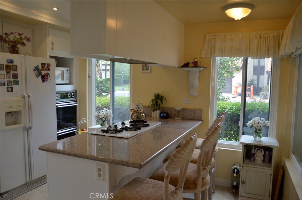 6574 Carioca Lane Riverside, CA 92506 - Photo 29 of 45 a dining room with furniture and window
