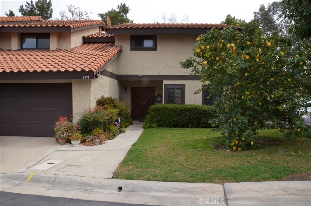 6574 Carioca Lane Riverside, CA 92506 - Photo 37 of 45 a view of a house with a yard