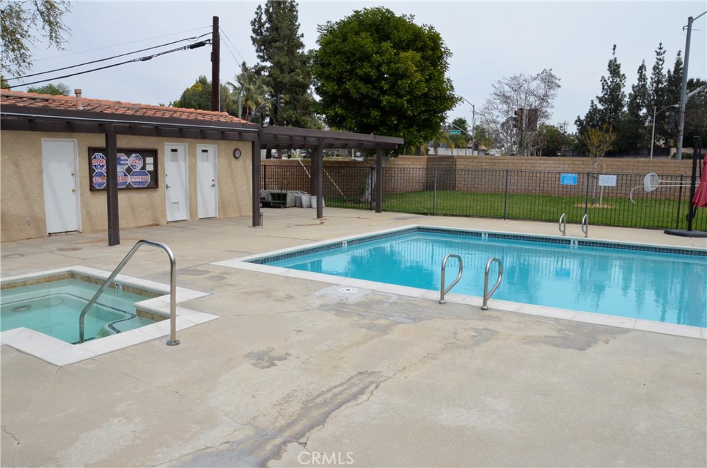 6574 Carioca Lane Riverside, CA 92506 - Photo 39 of 45 a view of a backyard with a patio and a yard