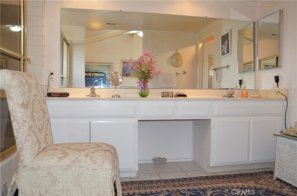 6574 Carioca Lane Riverside, CA 92506 - Photo 9 of 45 a bathroom with a sink and a mirror