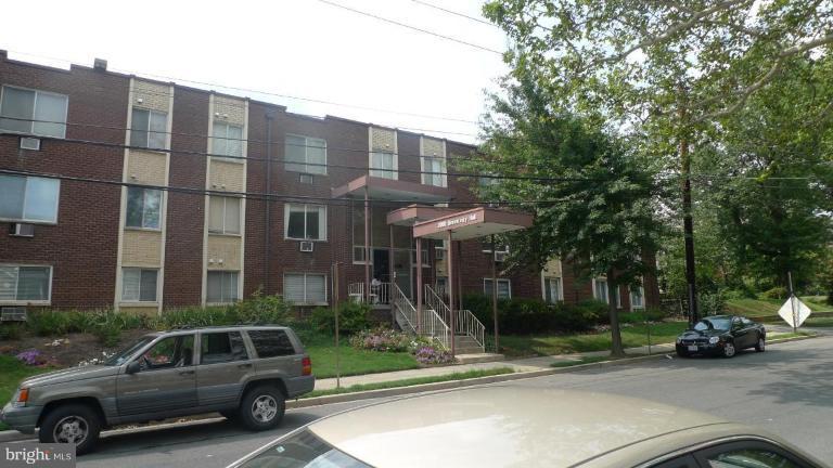 3000 7th Street Northeast, Unit 124 Washington, DC 20017 - Photo 1 of 27 a view of a car parked in front of a building