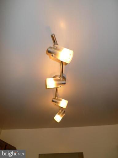 3000 7th Street Northeast, Unit 124 Washington, DC 20017 - Photo 14 of 27 a lamp on a small space