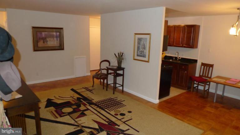 3000 7th Street Northeast, Unit 124 Washington, DC 20017 - Photo 5 of 27 a view of a workspace with furniture