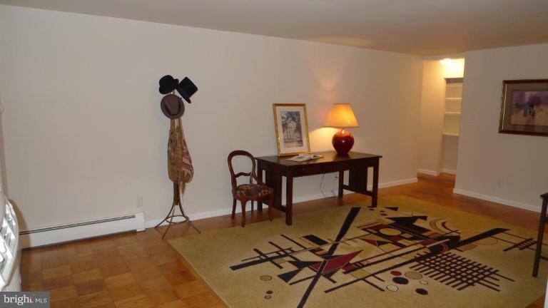 3000 7th Street Northeast, Unit 124 Washington, DC 20017 - Photo 9 of 27 a view of a workspace with furniture