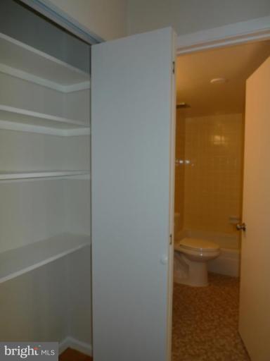 3000 7th Street Northeast, Unit 124 Washington, DC 20017 - Photo 10 of 27 a bathroom that has a toilet in it
