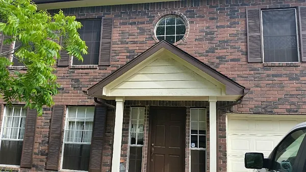 a view of house with outdoor space