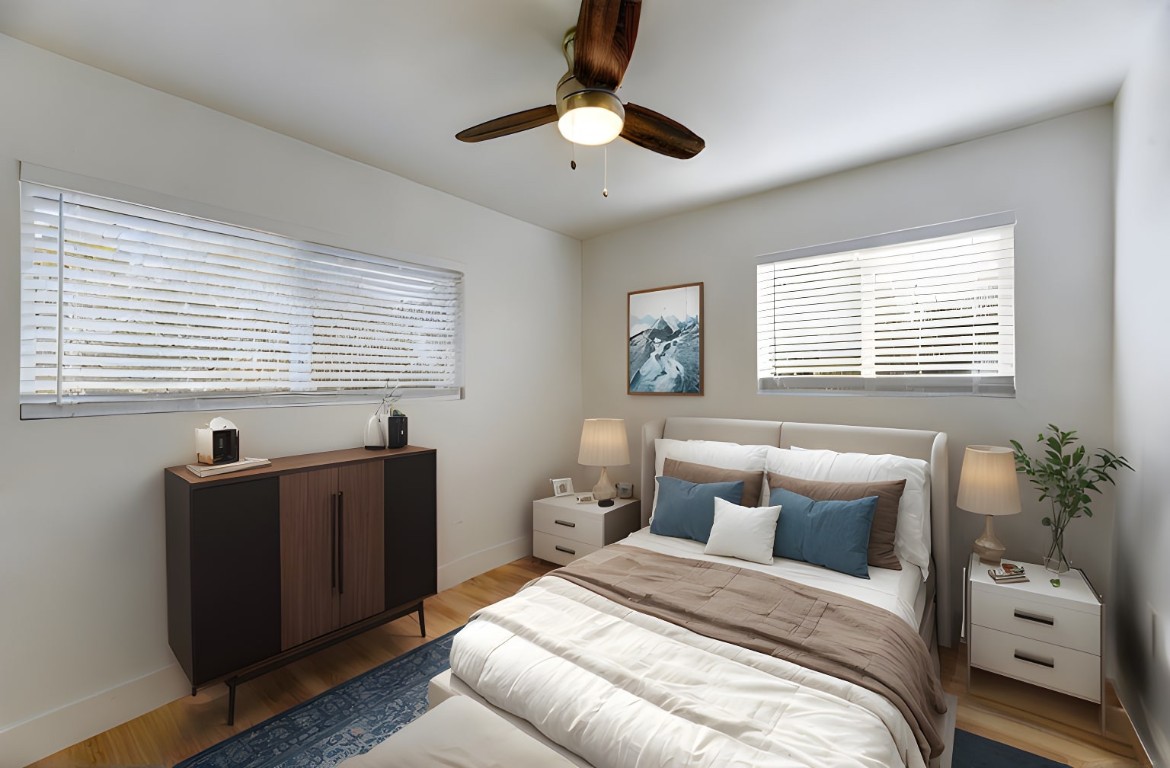 300 Lightsey Road, Unit 1 Austin, TX 78704 - Photo 18 of 21 a bedroom with bed and windows