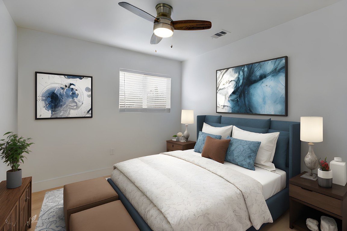 300 Lightsey Road, Unit 1 Austin, TX 78704 - Photo 19 of 21 a bedroom with a bed and a painting on the wall
