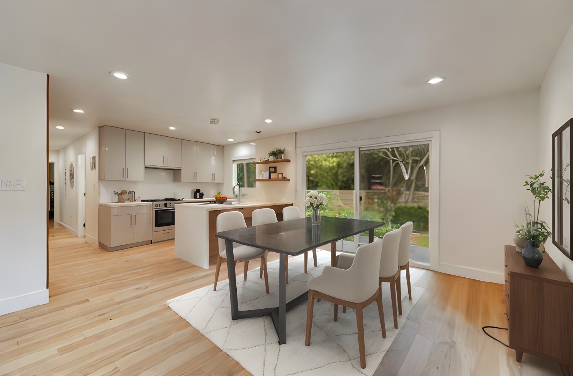 300 Lightsey Road, Unit 1 Austin, TX 78704 - Photo 3 of 21 a view of a dining room with furniture and wooden floor
