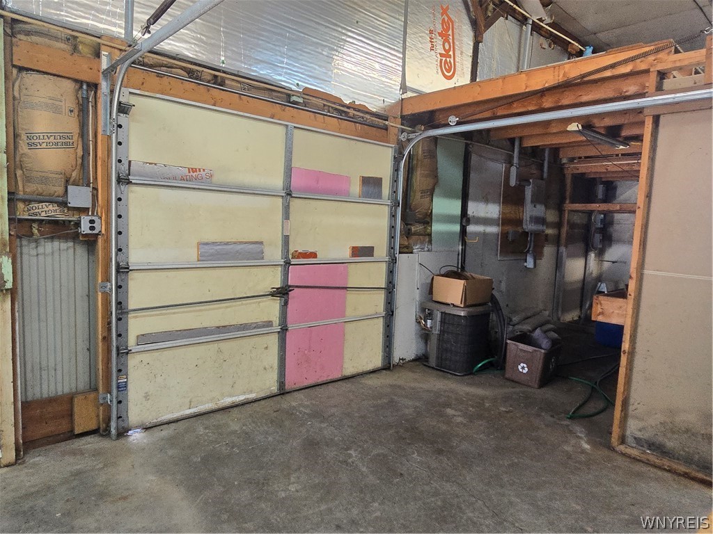 12507 Ridge Road Ridgeway, NY 14103 - Photo 21 of 22 6-car garage with 8.5 ft overhead door