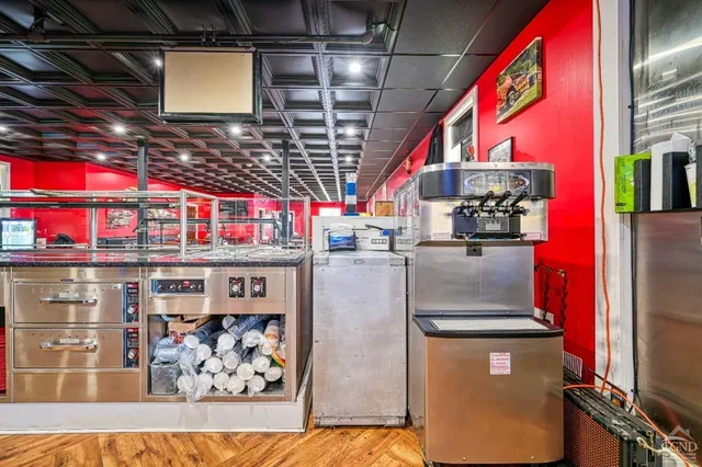 a kitchen with stainless steel appliances granite countertop a sink and cabinets