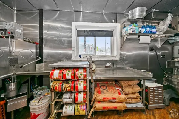 a bathroom with a tub and shower