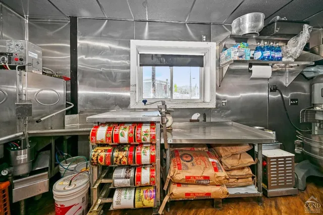 a bathroom with a tub and shower