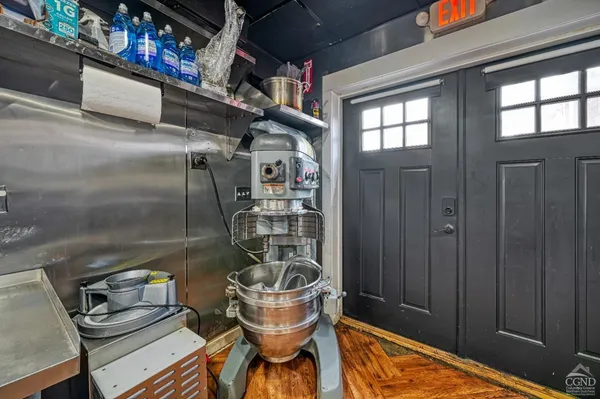 a kitchen with stainless steel appliances granite countertop a stove and a refrigerator