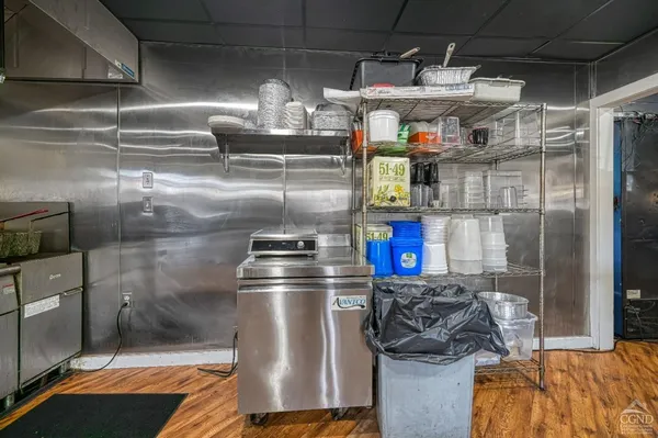 a view of a swimming pool with outdoor seating
