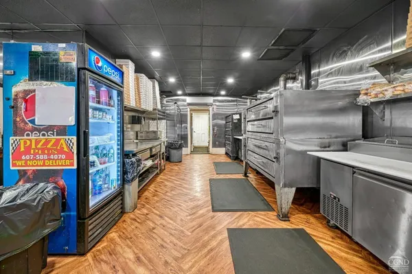 a view of a chairs and table in a room