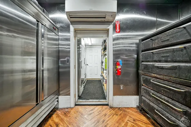 a view of a livingroom with furniture and window