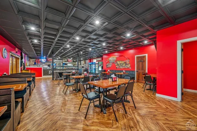 a view of a water fountain in front of a building