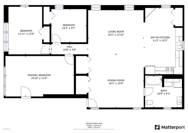 an aerial view of a swimming pool with a yard
