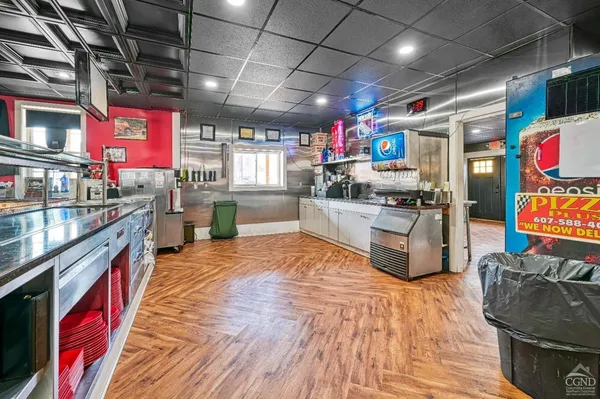 a room with furniture and gym equipment