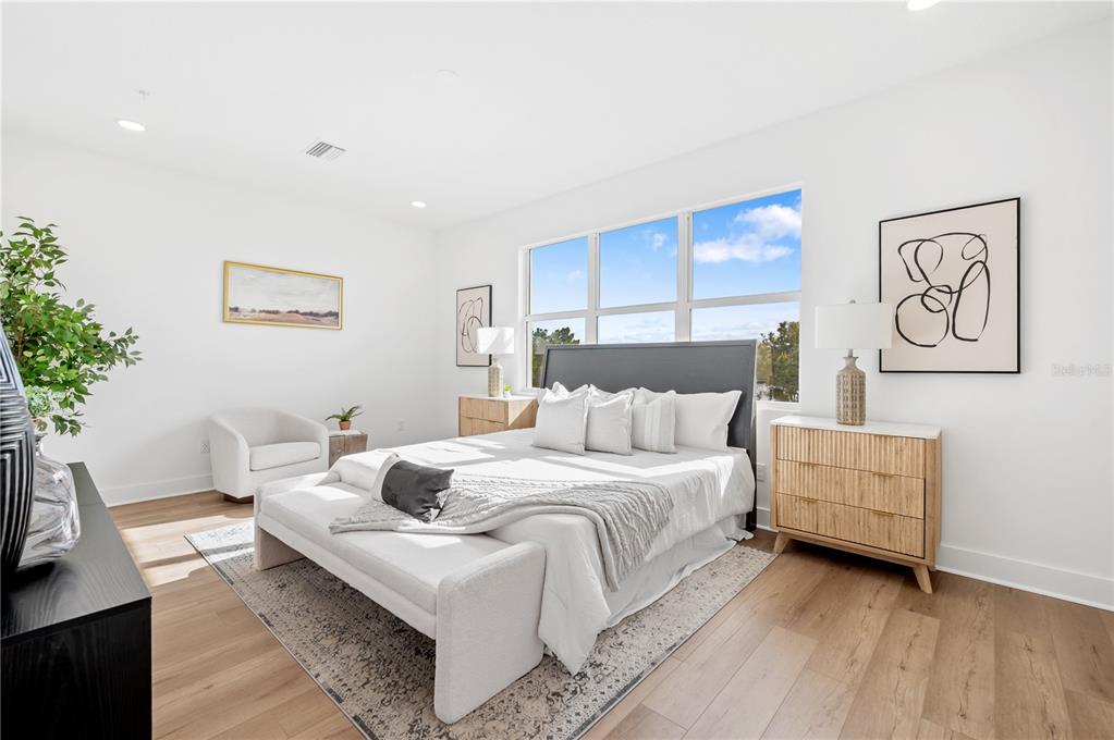 9992 Key Haven Road Seminole, FL 33777 - Photo 18 of 49 a bedroom with a bed and a couch