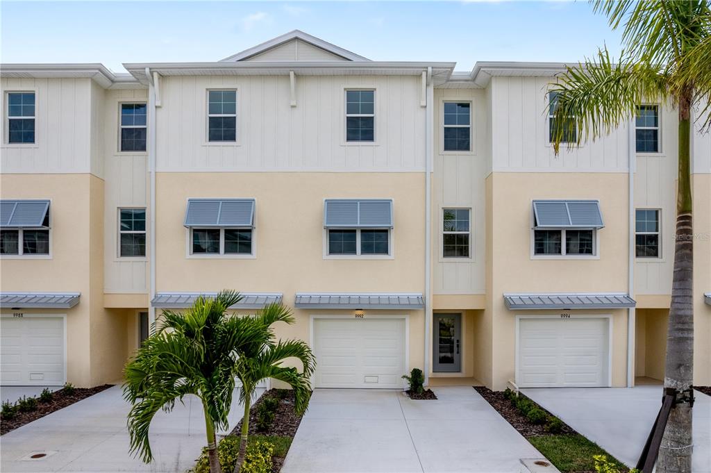 9992 Key Haven Road Seminole, FL 33777 - Photo 2 of 49 a view of a house with a backyard