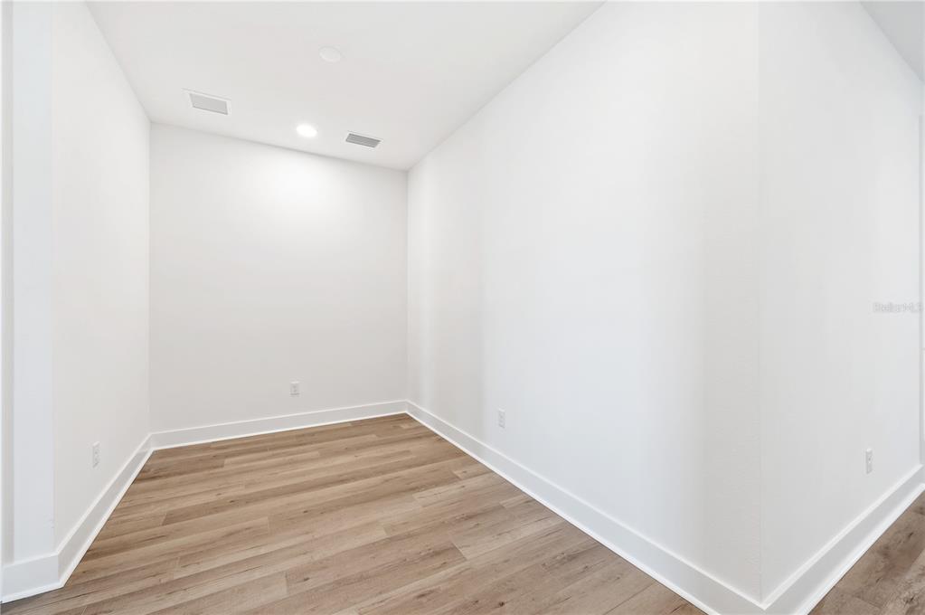 9992 Key Haven Road Seminole, FL 33777 - Photo 24 of 49 a view of small space with wooden floor