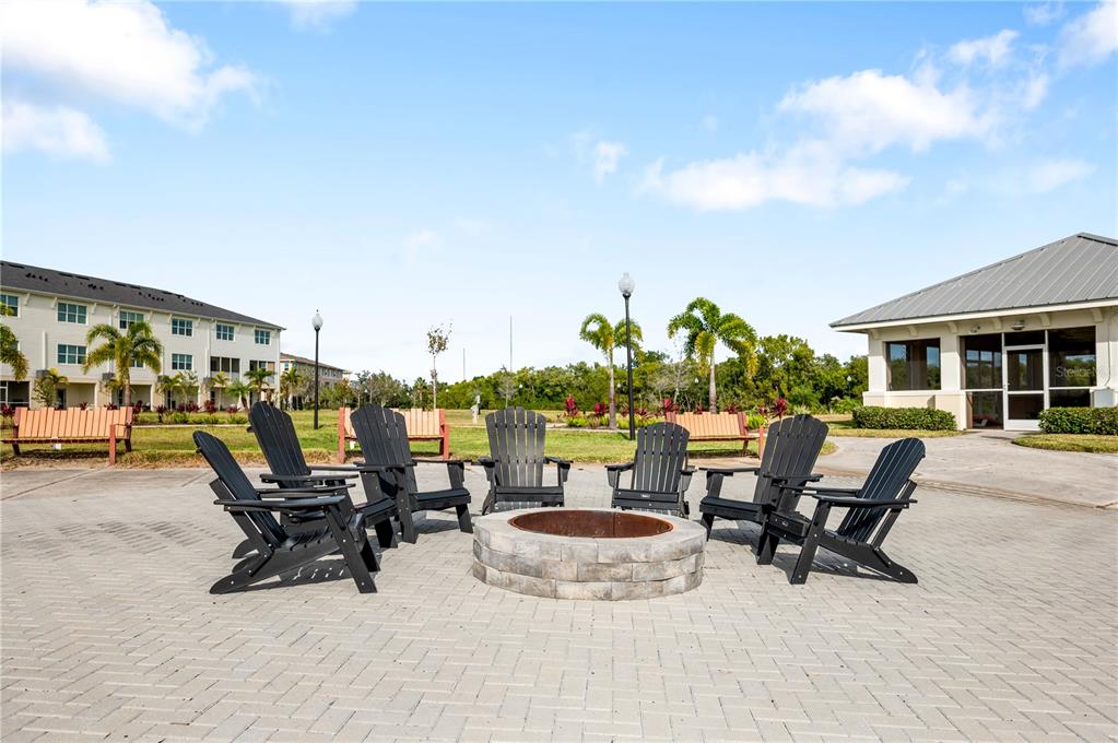 9992 Key Haven Road Seminole, FL 33777 - Photo 40 of 49 a view of a patio with a table and chairs