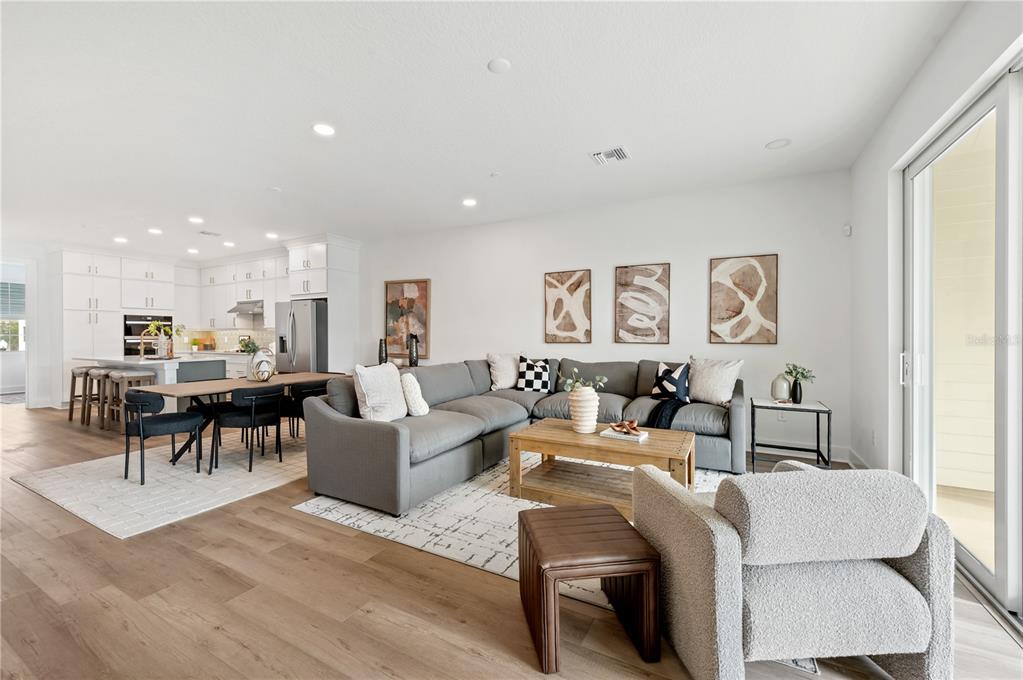 9992 Key Haven Road Seminole, FL 33777 - Photo 10 of 49 a living room with furniture and a large window