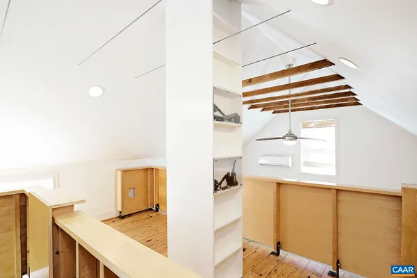 a kitchen with a refrigerator and a sink