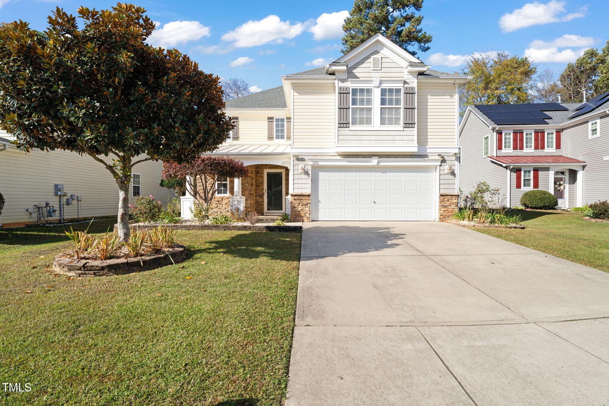 2816 Roundleaf Court Raleigh, NC 27604 - Photo 33 of 37 a front view of a house with garden