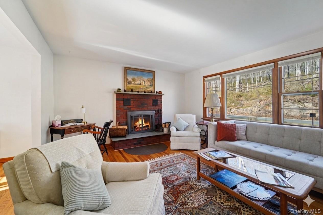 154 Old State Road Highland Falls, NY 10928 - Photo 4 of 49 Living room with wood-burning fireplace.