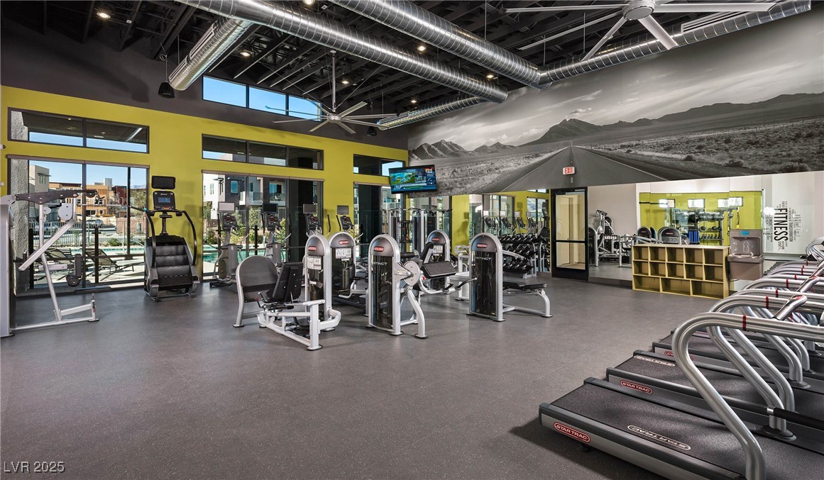 11238 Essence Point Avenue, Unit 201 Las Vegas, NV 89135 - Photo 39 of 52 Exercise room with a towering ceiling