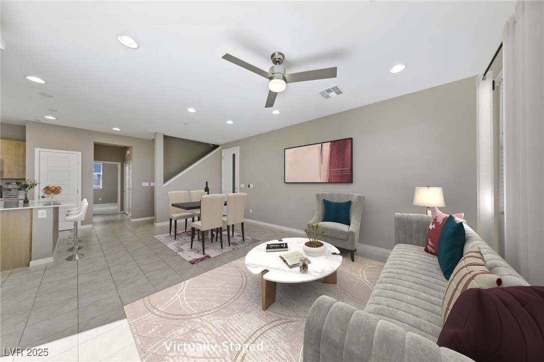 11238 Essence Point Avenue, Unit 201 Las Vegas, NV 89135 - Photo 4 of 52 Living area with light tile patterned floors, a ceiling fan, and recessed lighting