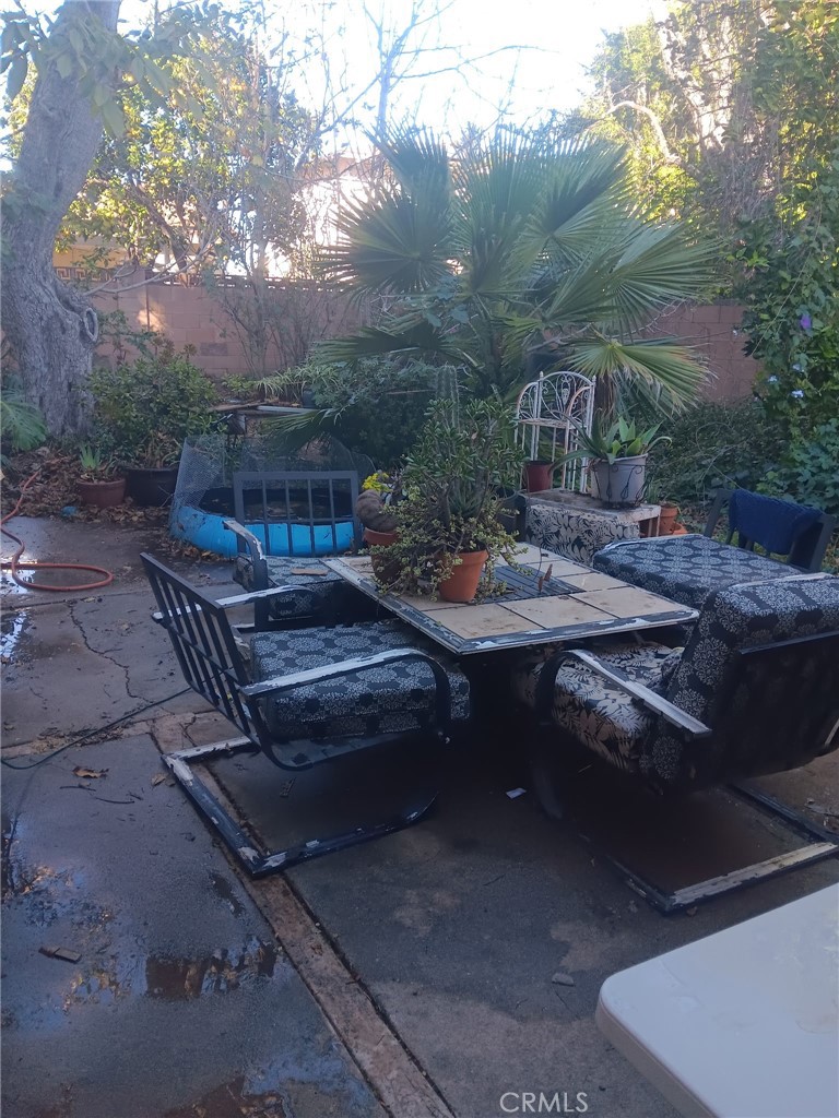 3297 Elmore Street Simi Valley, CA 93063 - Photo 23 of 24 a view of a backyard with sitting area