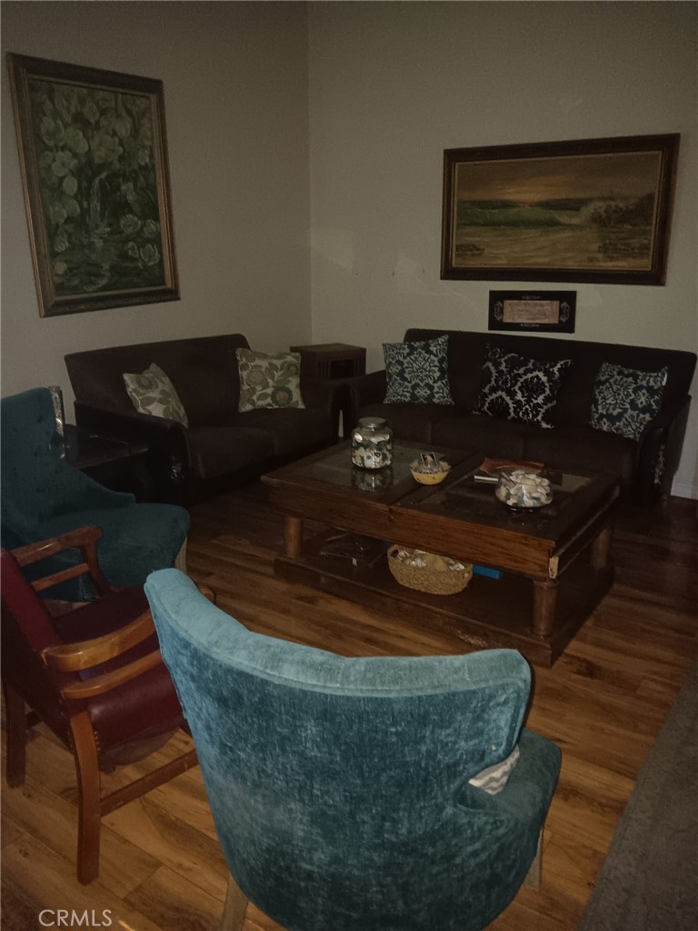 3297 Elmore Street Simi Valley, CA 93063 - Photo 24 of 24 a living room with furniture and a fireplace