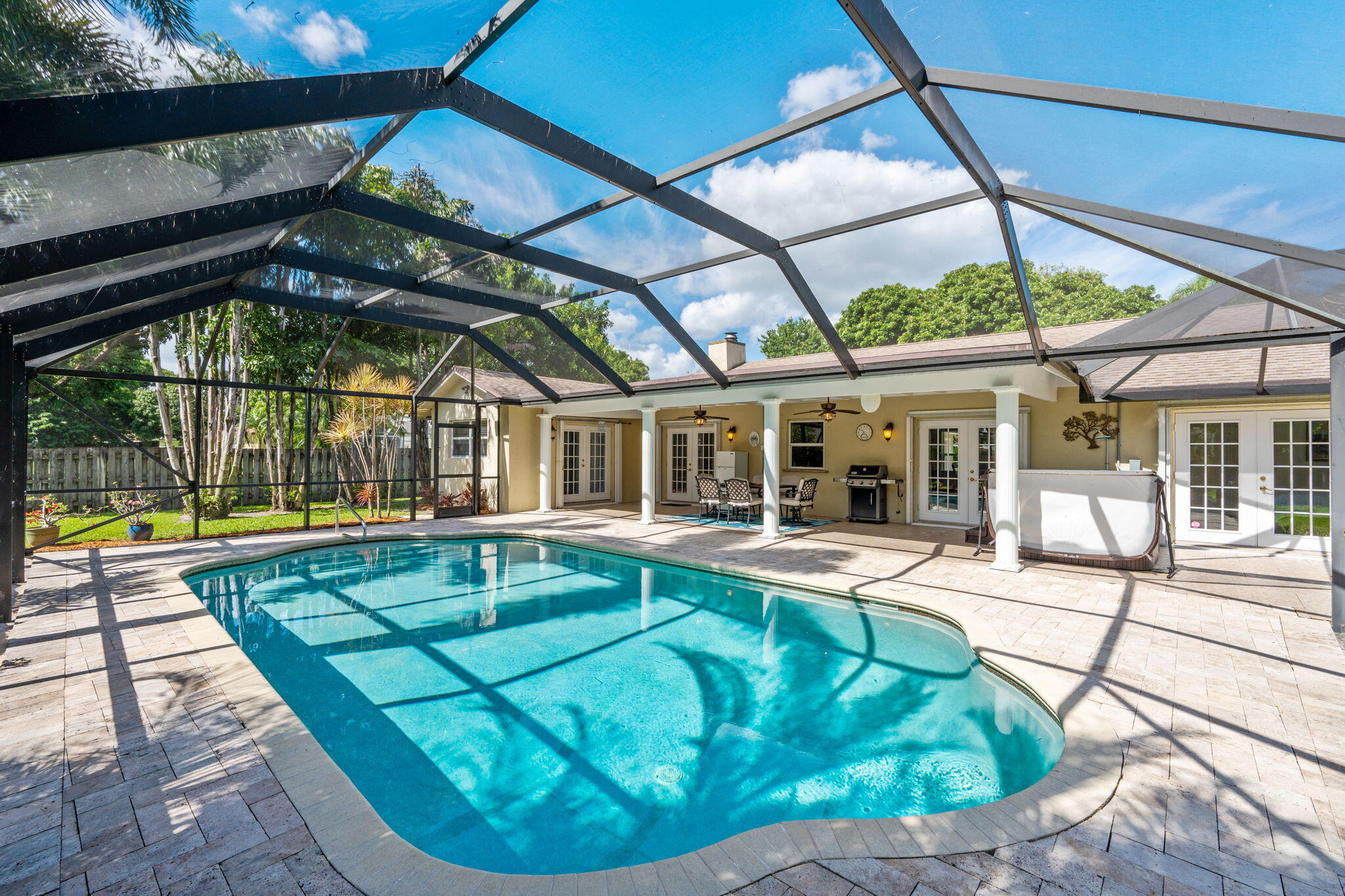 240 Sulky Way Wellington, FL 33414 - Photo 21 of 26 a view of a house with swimming pool