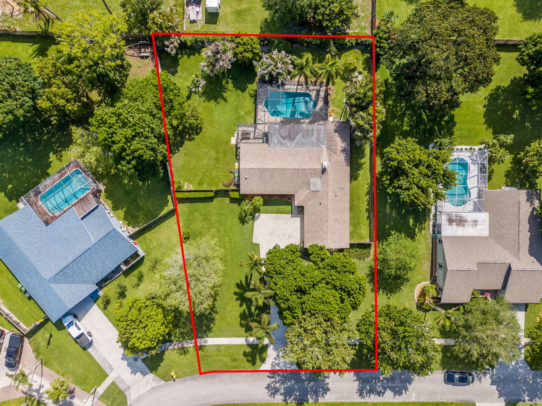 240 Sulky Way Wellington, FL 33414 - Photo 26 of 26 an aerial view of a house with a yard basket ball court and outdoor seating