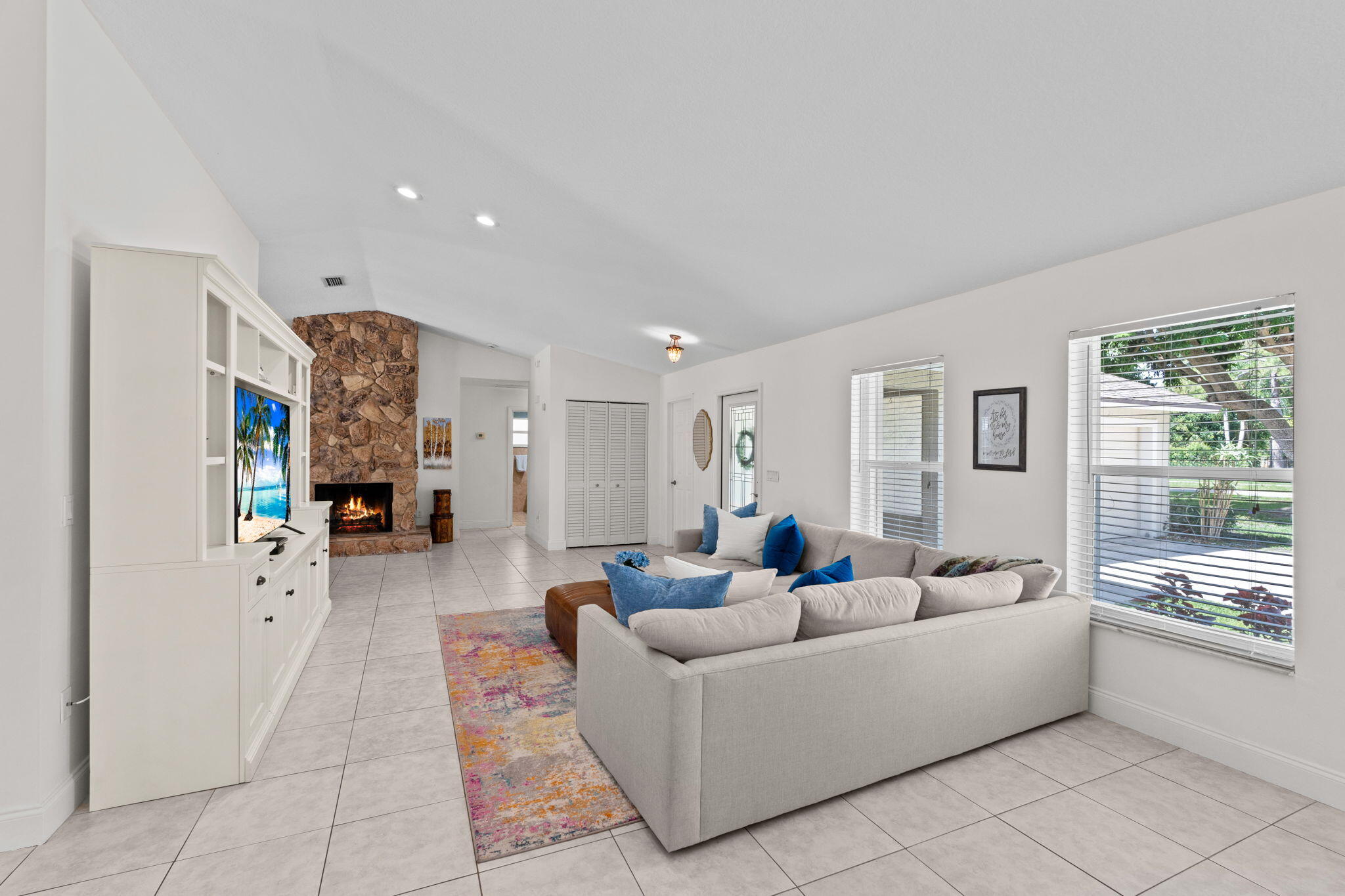 240 Sulky Way Wellington, FL 33414 - Photo 5 of 26 a living room with furniture and a large window