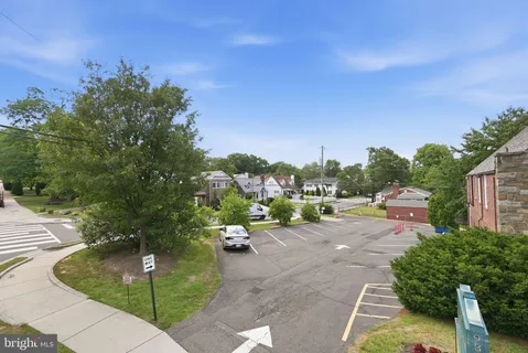 a view of a street with houses