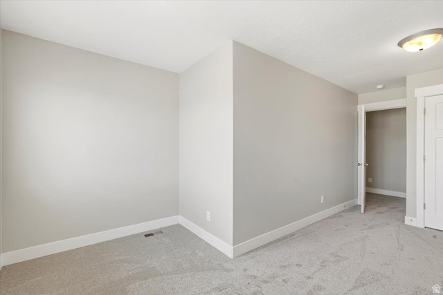 847 225 South Springville, UT 84663 - Photo 16 of 23 Carpeted room with light gray walls, white baseboards, and a white ceiling