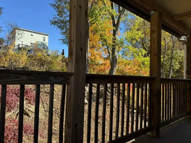 a view of a glass door with a balcony