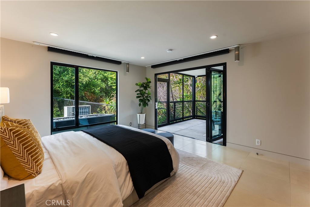 21656 Las Flores Heights Road Malibu, CA 90265 - Photo 37 of 71 Downstairs bedroom