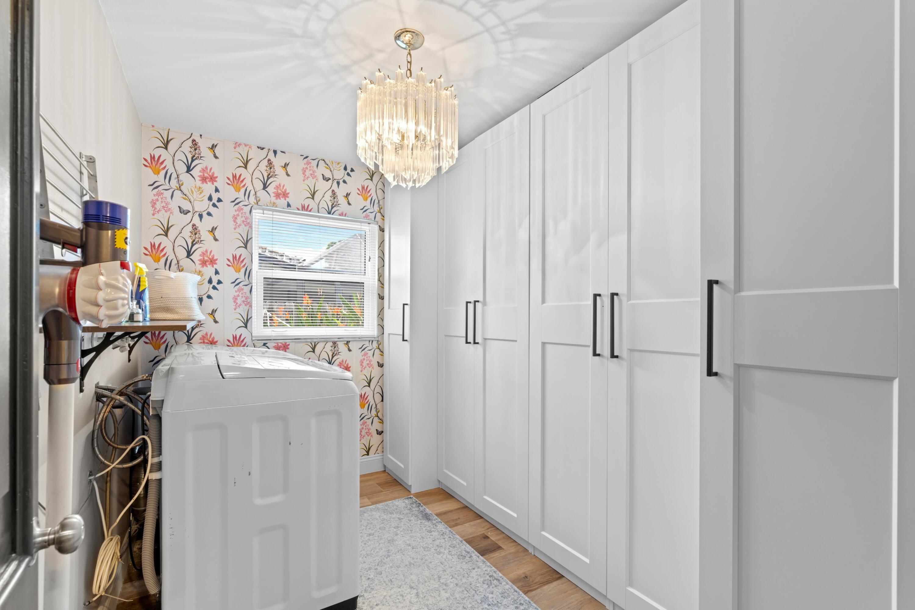 1039 Northwest 8th Street Boca Raton, FL 33486 - Photo 10 of 17 a view of a livingroom with storage space