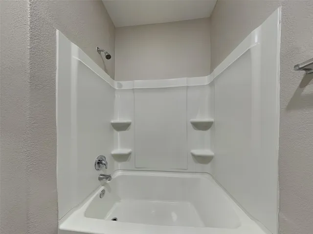 a bathroom with a tub