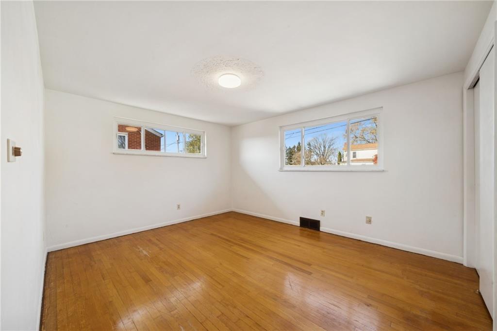 421 Robbins Station Road Irwin, PA 15642 - Photo 22 of 33 a view of empty room with wooden floor